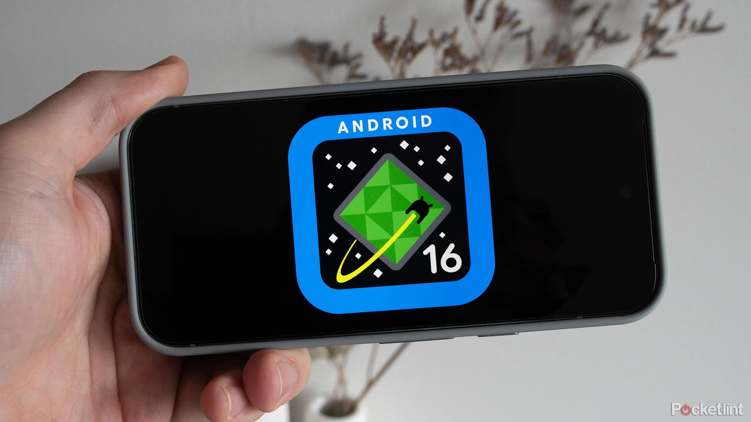 Hình nền hoặc logo Android 16, đại diện cho hệ điều hành Android phiên bản mới hỗ trợ chuyển eSIM